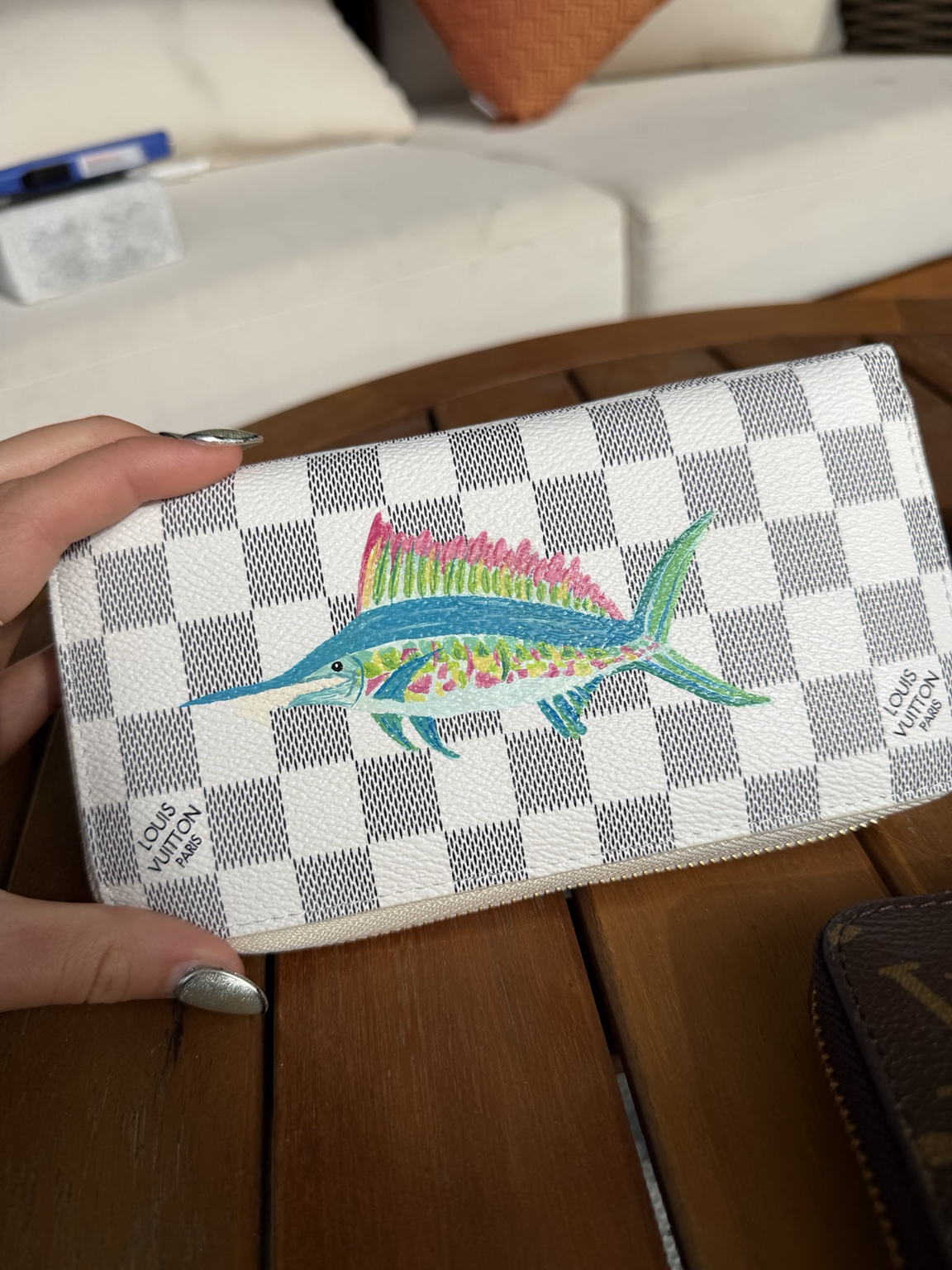 Pink & blue fish wallet painted by Rayna